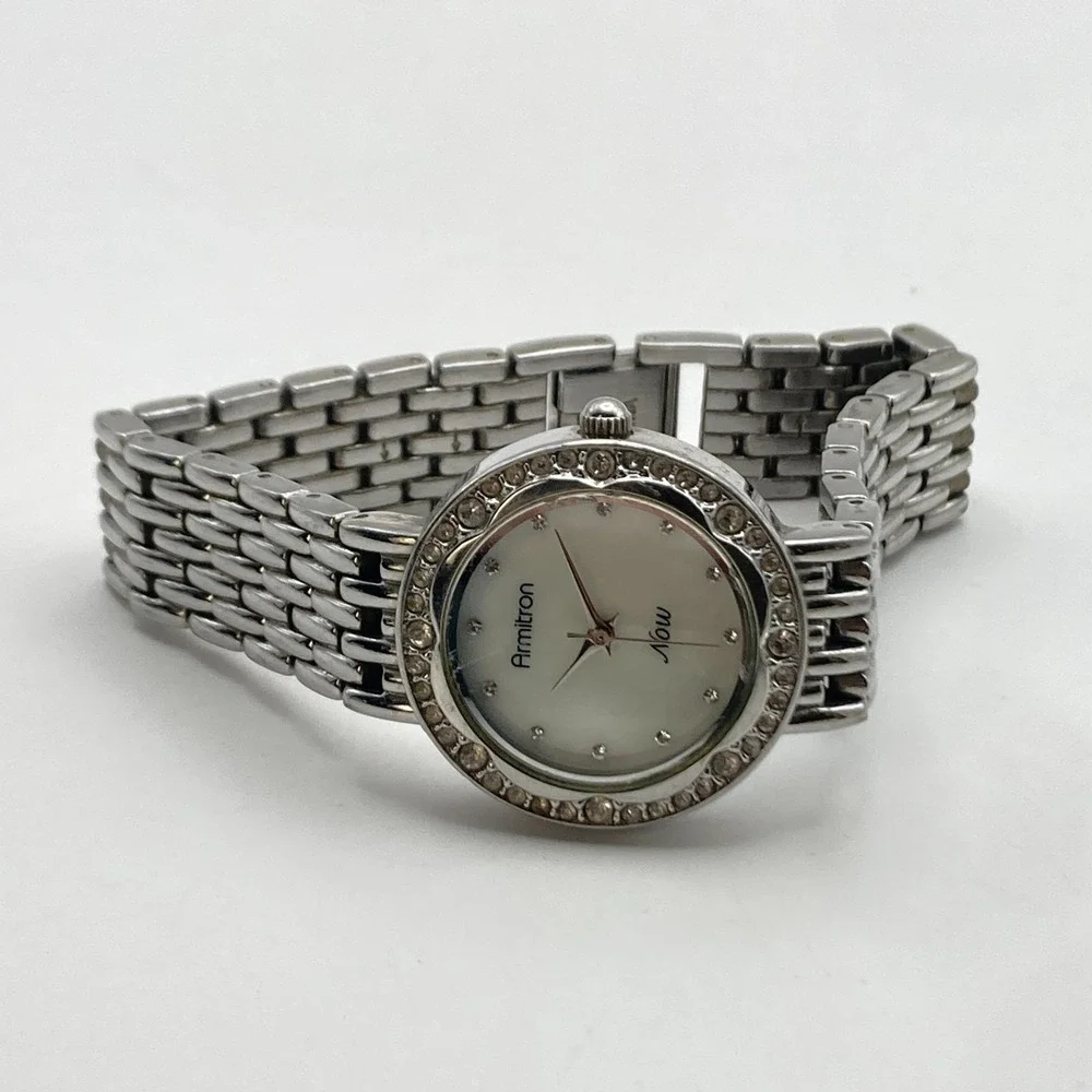 Armitron Now Women's Watch 28mm Silver Tone Crystals MOP Dial New Battery 6.75